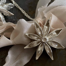 Load image into Gallery viewer, Silver Star Anise Oriental Star necklace Photo credit Emily Quinton
