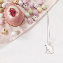 Load image into Gallery viewer, Silver 'Just Sitting There Hare' necklace with Easter Eggs